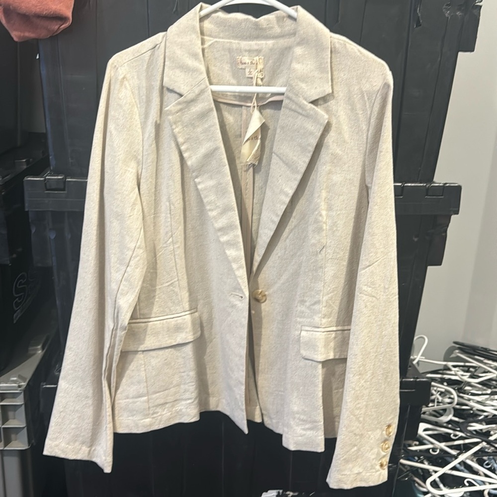 Hem and thread linen blazer